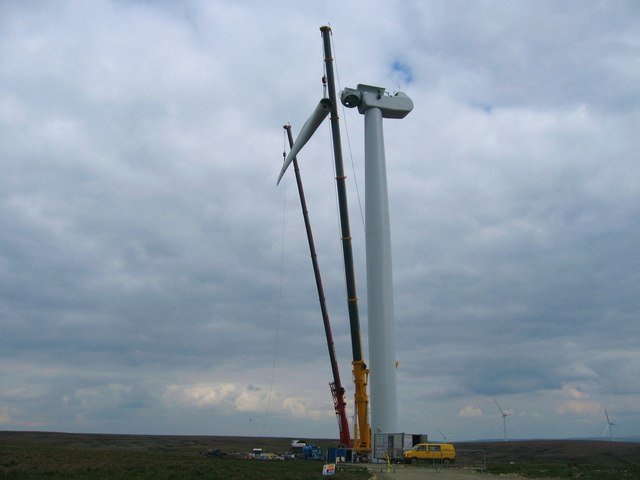 crane putting up a wind turbine