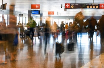 Travelers in a busy airport